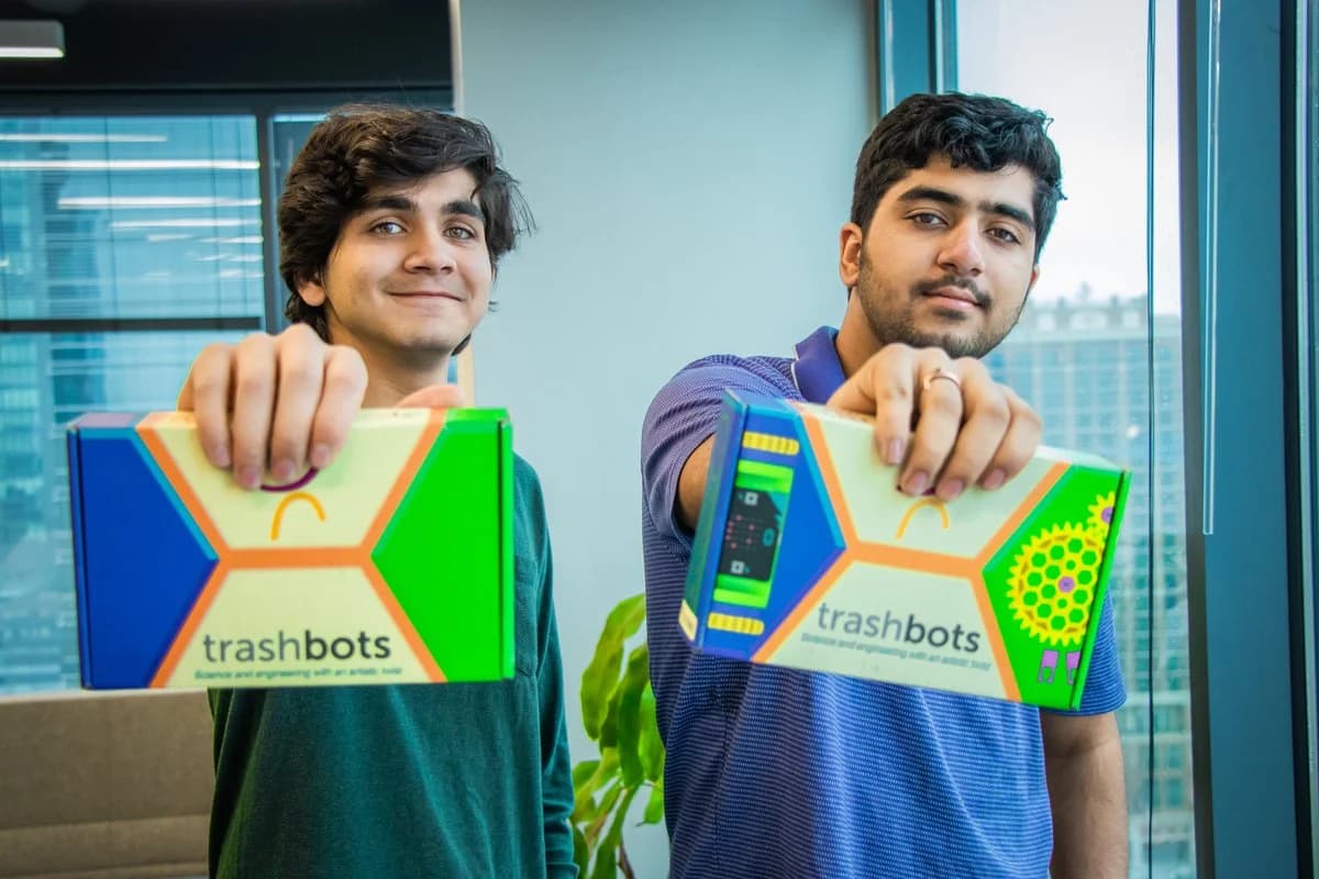 Rohit and Sidharth Srinivasan holding their Trashbots kits