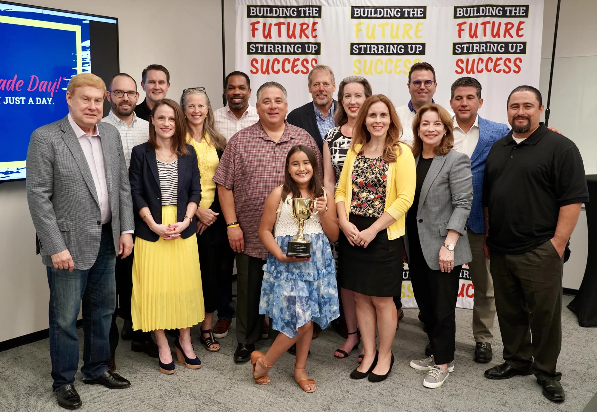 Brianna with the Lemonade Day team at her award ceremony