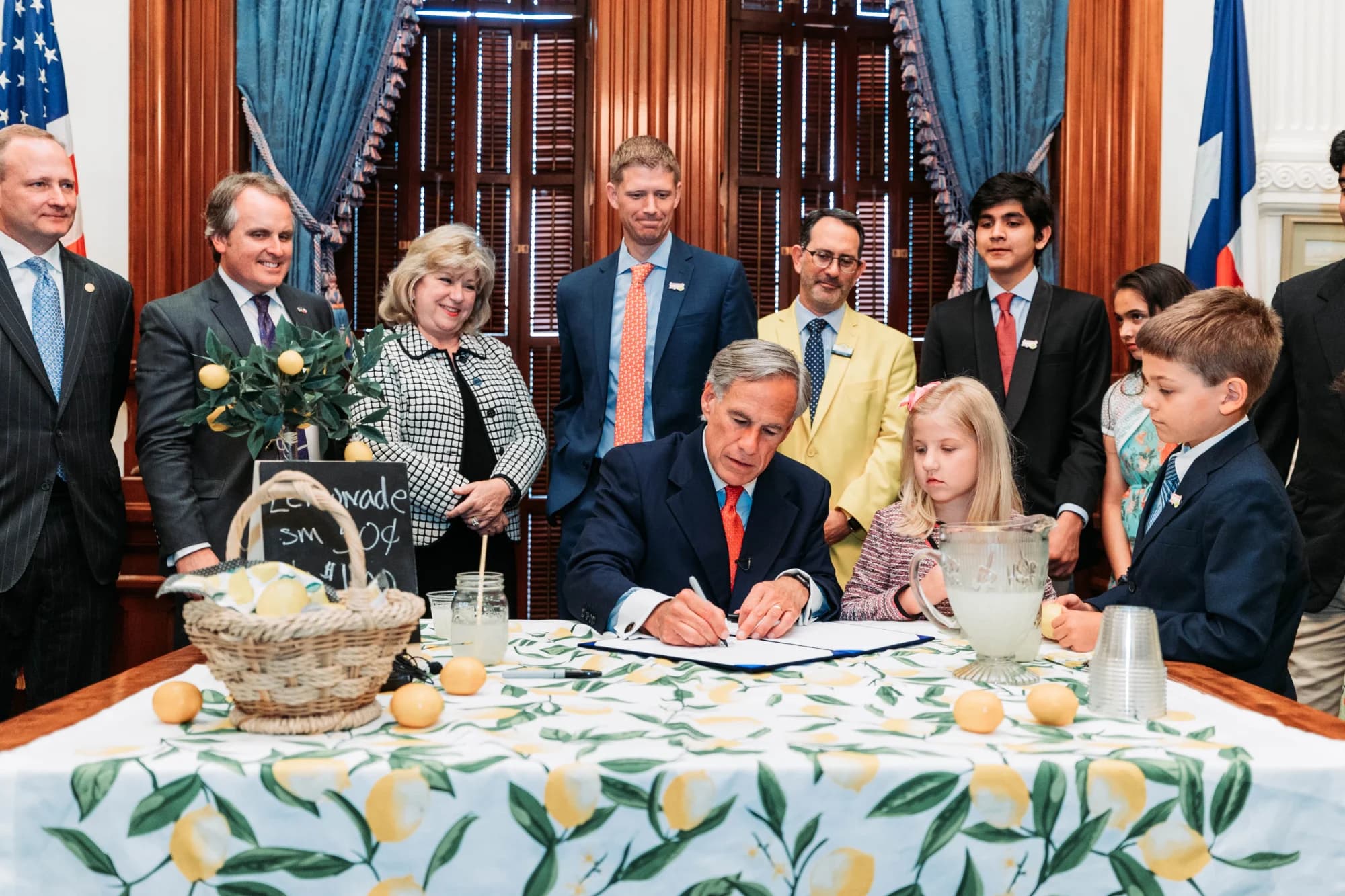 Kids watching the Texas governor sign the Lemonade Day proclamation